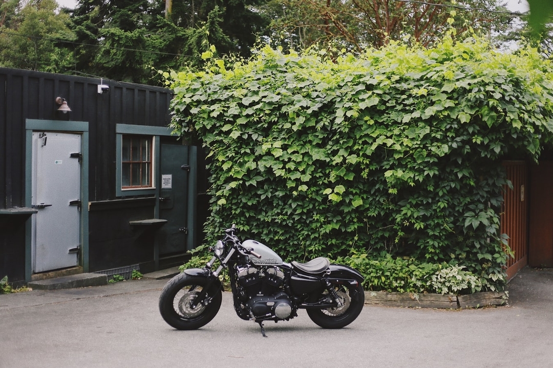 Black motorcycle in the yard