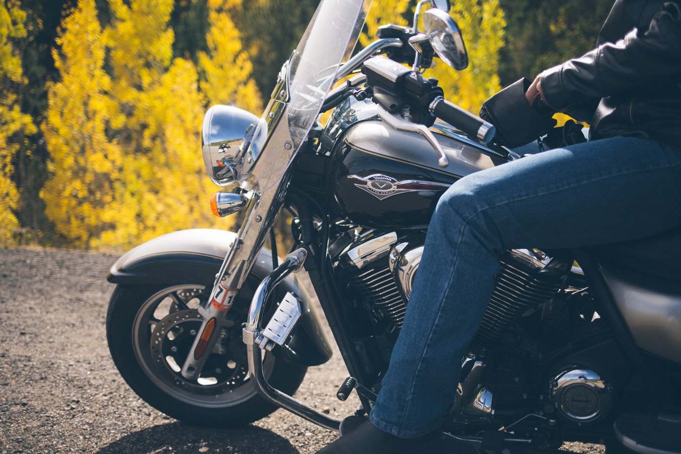 Men riding a motorcycle