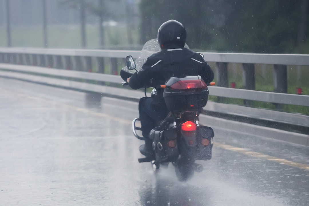 motorcycle rider in the rain