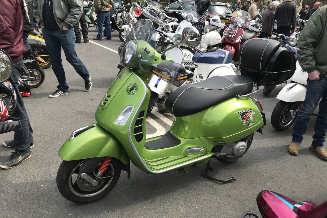 Green Vespa scooter